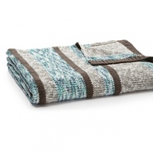 Bold stripes of color accent this cozy throw from Sky.