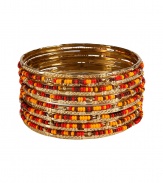 With an ethnic-inspired aesthetic, this chic bangle from R.J. Graziano will add stylish appeal to any look - Large size, metal and bead detailing - Pair with a 1970s-inspired look or with an elevated jeans-and-tee outfit