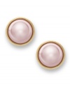 Perfection in pink. Charter Club's sophisticated stud earrings feature simulated pink pearls in a gold tone mixed metal bezel setting and post backing. Approximate diameter: 1 inch.