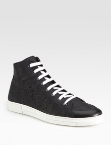 This gancini-embroidered canvas lace-up, with a hi-top profile and contrast sole, is the epitome of casual luxury.Canvas upperLeather liningPadded insoleRubber soleMade in Italy