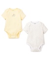 Crafted in the softest cotton, these giraffe-embroidered body suits bring a touch of luxury and fun to your baby basics.