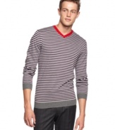 Go from dud to stylish stud in the Sons of Intrigue stripe v-neck long sleeve fitted sweater.