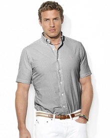 The embodiment of preppy heritage, a classic-fitting shirt is rendered in light-as-air seersucker cotton with sleek stripes for a casual warm-weather look.