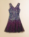 She'll be a real showstopper in this glitzy, sequined frock with full skirt, perfect for twirling and dancing.V-neckSleevelessPullover styleFull skirtFully linedPolyesterDry cleanImported