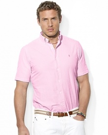 The embodiment of preppy heritage, a classic-fitting shirt is rendered in light-as-air seersucker cotton with sleek stripes for a casual warm-weather look.