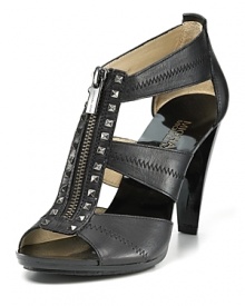 Hardcore hardware lends edgy appeal the the Rock N Roll Berkley sandals, a studded silhouette that exudes downtown chic. From MICHAEL Michael Kors.