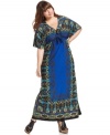 Score a boho vibe with One World's short sleeve plus size maxi dress, cinched by a drawstring waist.