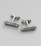 Cable column cuff links in silver and 18K gold. Imported