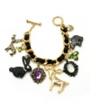 Cute and charming! An adorable array of furry friends from the forest--including a bear, a bunny rabbit and two deer--steal the show on Betsey Johnson's chain link charm bracelet. Along with sparkling crystal medallions, a heart charm and leaf accents, it's further accented by an intertwined grosgrain ribbon. Set in gold tone mixed metal. Approximate length: 7-1/2 inches.