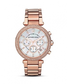 A gleaming mother of pearl dial is framed by a Swarovski crystal encrusted bezel in this glamorous timepiece from MICHAEL Michael Kors.