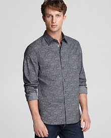 Spruce up your night-on-the-town wardrobe with a handsome paisley print shirt tailored with a modern slim fit.