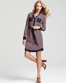 A retro striped print and glimmering gold-tone buttons lend stylish '70s sophistication to this Tory Burch shirt dress. Keep the laid-back vibe going with chunky platforms and strands of golden chains.