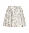 Stylish skirt in fine, printed cotton blend - Sweet, summery floral motif in pale grey and cream - Modified A-line silhouette bells at hem, hits mid-thigh - Gently pleated front, belt loops and button closure - Flattering and ultra-feminine, seamlessly transitions from work to weekend - Pair with a fitted t-shirt or button down blouse and sandals or ballet flats