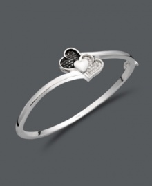 This Treasured Hearts design puts a modern twist on the iconic heart symbol. This stylish bangle features three overlapping hearts and shines with the addition of round-cut black diamonds (1/6 ct. t.w.) and white diamonds (1/3 ct. t.w.). Crafted in sterling silver. Approximate diameter: 2-1/2 inches.