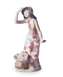 Have a luau in your living room with Lladro's beautiful hula dancer. Wearing a traditional flower lei and Hawaiian-style skirt, this handcrafted figurine evokes all the allure of the Aloha state.