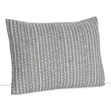 Embroidered lines in shades of white and grey stripe this soft chambray pillow.