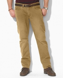 Casual pants tailored from sun-faded mid-weight chino, designed for authentic five-pocket styling and a straight leg. Standard-rise belted waist with Ralph Lauren's signature shank closure. Five-pocket jean styling with signature metal rivets. Flat-front with a timeworn, vintage feel.