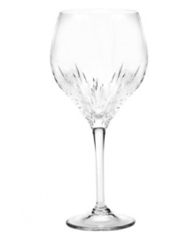 In a collaboration worthy of Wallis and Edward, renowned bridal designer Vera Wang and Wedgwood have created Duchesse stemware. Featuring tapering round bowls and a blazing starburst cut that contrasts delicately with the textures of the matching dinnerware, Duchesse sits on a flared pedestal. Goblet shown in center.