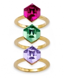 Gorgeous jewel tones--in fuchsia, emerald green and violet--set apart these stylish stackable rings from Swarovski. Whether worn alone or together, they're sure to look stunning! Set in gold tone mixed metal. Size 7.