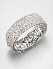 Shell Pattern Sparkle BangleThe lacy shell pattern of this shimmering pavé design is as feminine as it is fabulous.CrystalRhodium platingDiameter, about 2.25Hinged with tongue-and-groove claspImported