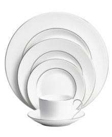 At once classic and contemporary, the Blanc sur Blanc dinnerware set by Vera Wang and Wedgwood marries white bone china with a textured matte border and polished platinum finish. Place settings for four elevate every occasion with understated grace.