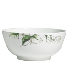 Vera Wang's Floral Leaf watercolor adds fresh artistry to this chic bone china serving bowl. A smooth coupe shape in clean white blooms with crisp greens for a modern look and feel that's ideal for every day.