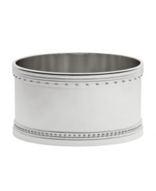 Echoing the elegant details of a wedding dress, Vera Wang's Grosgrain wine coasters marry clean lines in a lavish silver plate with ribbon-inspired trim.