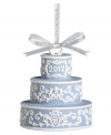 Two celebrations in one. Three tiers of powder-blue Wedgwood porcelain decked in scrolling white make this Our First Christmas cake ornament a must for newlyweds – and a cute wedding gift!