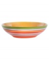 A brilliant line up. Calypso serving bowls brighten every day with hand-painted bands of tropical color in easy-care earthenware. From Clay Art.