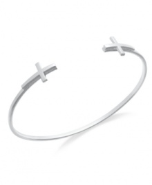 The shine of the cross. Studio Silver's cuff bracelet, set in sterling silver, features a design that's sure to impress and convey a strong personal connection. Approximate diameter: 2-1/2 inches.