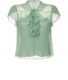 Delicate top of fine, light green silk - Transparent look is feminine and romantic - Thin-strapped tank underneath - Elegant look with ruffled neck tie, short-waisted silhouette with small collar and cap sleeves - Beautiful with tuxedo pants or pencil skirt, and heels for the office or formal dinner