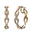 Traditional hoop earrings with a modern spin. Monet earrings feature interlocking teardrops decorated with glittering glass stones. Crafted in gold tone mixed metal. Approximate diameter: 1-1/2 inches.