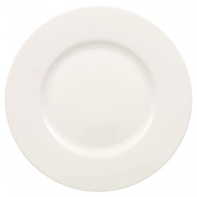 Anmut will be the choice for purists; it is an undecorated white that beautifully shows off the glamorous forms and quality bone china. Dishwasher and microwave safe. Accessories shown: oval platter, round vegetable bowl, creamer, sugar bowl.