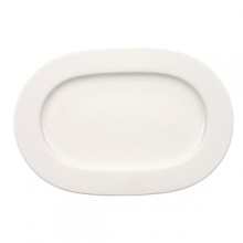 Anmut will be the choice for purists; it is an undecorated white that beautifully shows off the glamorous forms and quality bone china. Dishwasher and microwave safe. Accessories shown: oval platter, round vegetable bowl, creamer, sugar bowl.