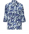 Contemporary daytime looks get an exquisitely exotic finish in Versaces bright tonal blue animal print silk top, complete with graphic patterning for a luxe take on one of this seasons favorite trends - Classic collar, slit with button closures, 3/4 dolman sleeves, stitched cuffs, straight fit - Pair with a jet black pencil skirt and platform pumps for work