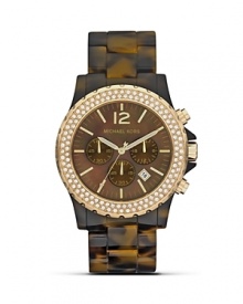 A gold-tone and crystal-rimmed bezel crowns this lush tortoise timepiece with opulent polish. From MICHAEL Michael Kors.