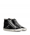 Luxe with a retro edge, these high-top sneakers from Golden Goose will kick your style into high gear - Round toe, lace up style, side star detail, exposed side-zip closure, stylishly distressed, contrasting rubber sole - Pair with jeans or cargo pants, a tee, and a leather jacket