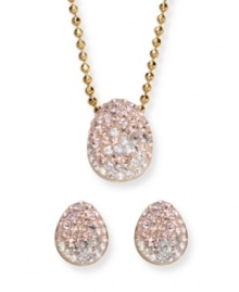 Refine your look with this all-time favorite style by Swarovski. Timelessly elegant, this gold tone mixed metal pendant and earrings set sparkles in silk, light peach, silver shade, moonlight and clear Swarovski crystals set in Pointiage®. Approximate length: 15 inches. Approximate drop: 1/2 inch. Approximate earring drop: 3/4 inch.