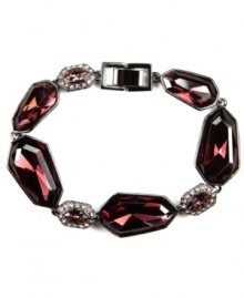 Look ravishing in red! A gorgeous vintage rose hue stands out on this elegant flex bracelet from Givenchy. Featuring faceted asymmetrical glass accents, it's made in hematite tone mixed metal. Approximate length: 7-1/4 inches.