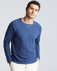 A cool, comfy classic from Vince, the longsleeve sweatshirt with v inset at the neck and raglan sleeves.