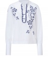 Stylish white top with blue embroidery from Ermanno Scervino - A fun quirky-cool print enlivens this flattering blouse - Small stand collar, button front placket with ruffle detail, front embroidery, long two-button cuffs - Wear with flared jeans, a military-style jacket, and stacked heel boots