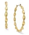 Say hello to these modern hoops from Alfani. With a wavy silhouette, they add pop to your already chic look. Crafted in gold tone mixed metal. Approximate diameter: 2-5/8 inches.