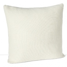 A chunky, soft knit sham in a neutral hue from DIANE von FURSTENBERG elevates a simple bedding ensemble.