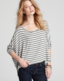 Master laid-back chic with Red Haute's striped, poncho-shaped top, the perfect way to top off jeans and slip-on sneakers.