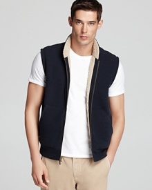 Thick and warm, this sherpa lined vest gives you a reliable and masculine outdoor option.