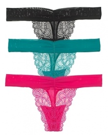 A sheer thong with a swirling floral lace overlay, a delicate and charming style from b.tempt'd.