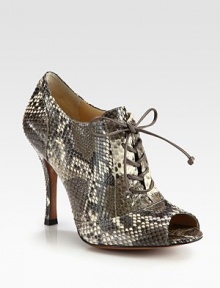 Trend-forward silhouette in luxurious python with smooth leather laces and a sexy peep toe. Self-covered heel, 4 (100mm)Python upper with leather lacesPeep toeLeather lining and solePadded insoleImported