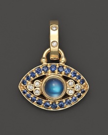 A gleaming blue moonstone, flanked by diamonds and sapphires, shines from a 18K yellow gold setting. by Temple St. Clair.