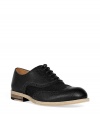 These stylish Marc Jacobs brogues feature classic details with a modern twist - Textured leather with nylon insets, perforated leather detailing, lace up, contrasting sole - Wear with a slim fit suit, printed button down, and stylish specs