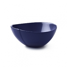 This fashion-forward porcelain dinnerware has signature DVF style - bold, unique, modern. The highly glossed surface, intentionally irregular curves and exposed seams create a chic tablescape and offer infinite styling possibilities. Mix and match with other colors in the Pebblestone collection to create your own signature look.